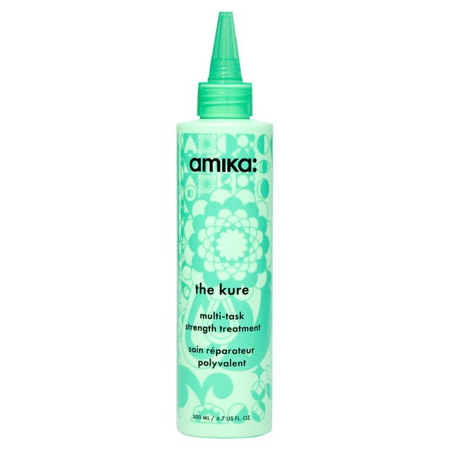 Amika 'the kure' multi-task strength treatment bottle on a white background - Hair Care Canada