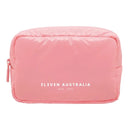 A pink puffer-style zippered pouch with 'ELEVEN AUSTRALIA est. 2011' printed in white on the front, shown against a plain white background.