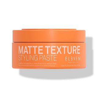 Orange jar of Matte Texture Styling Paste by Eleven on a white background-Hair Care Canada