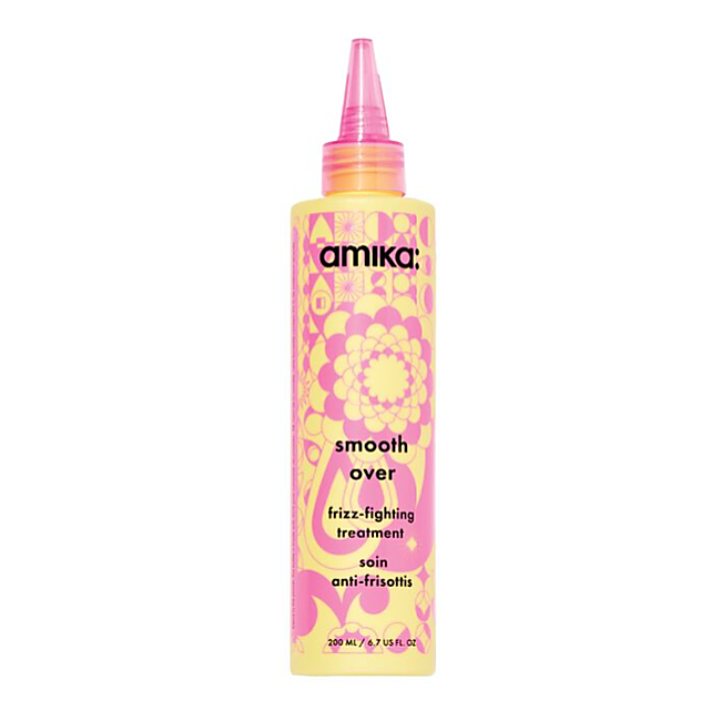 Amika smooth over frizz-fighting treatment bottle with pink cap on a white background - Hair Care Canada
