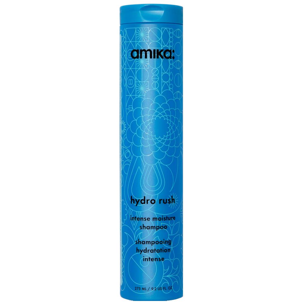 Blue shampoo bottle with 'amika' branding on a white background - Hair Care Canada