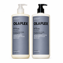 Two OLAPLEX haircare bottles on a white background: a Hydrating Curl Shampoo bottle with a white pump and a Hydrating Curl Conditioner bottle with a black pump. Both bottles are off-white with gray labels - Hair Care Canada