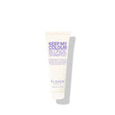 A white squeeze tube of Eleven Naturals Keep My Colour Blonde Shampoo, featuring purple text, set against a clean white background with a soft shadow.