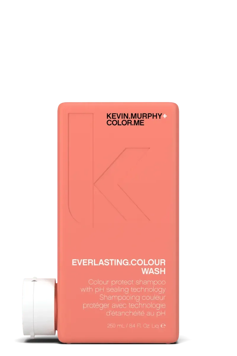 Kevin Murphy shampoo bottle with coral packaging on a white background