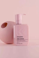 Kevin Murphy Angel Masque bottle on a pink background - Hair Care Canada 