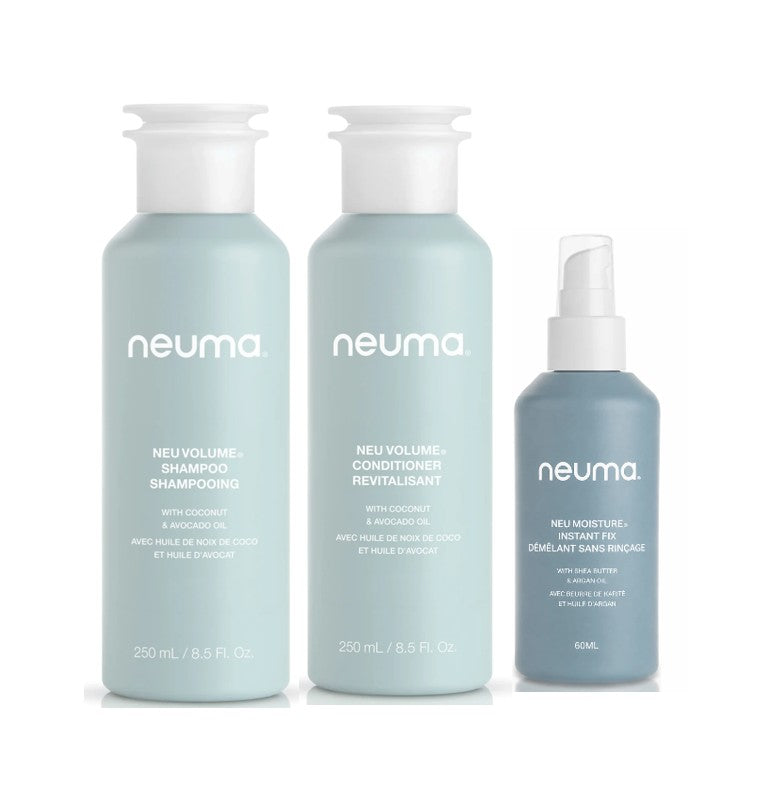 Three Neuma hair care bottles on a white background: a large pale mint shampoo bottle, a large pale mint conditioner bottle, and a smaller dusty blue moisturizing spray bottle - Hair Care Canada