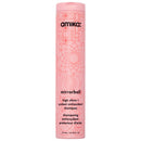 A tall, cylindrical pink bottle of amika mirrorball high shine protectant antioxidant shampoo, featuring a pink cap and a floral line-art pattern on a white background Hair Care Canada
